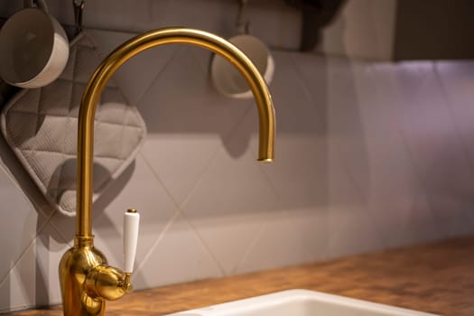 Water tap faucet in the kitchen for background