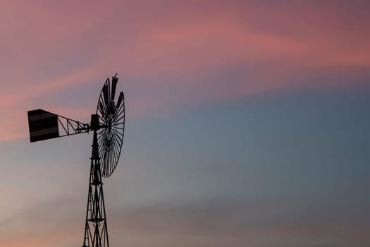 Windmill in the evening sky energy environmental