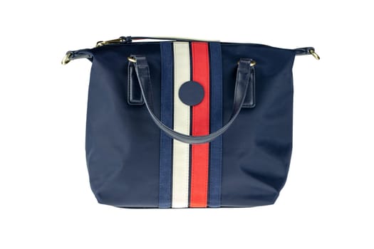 Stylish women's handbag. A fashionable female blue luxury handbag isolated on white. Clipping path. Fashionable womans accessories. Advertising.