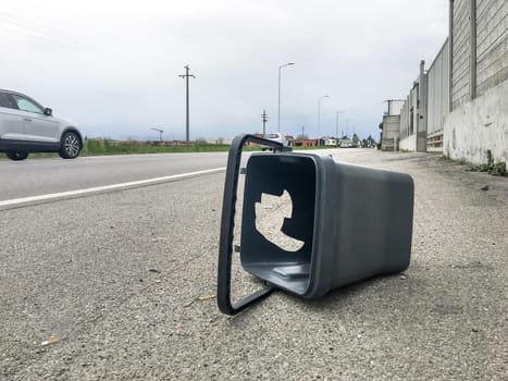 Bin that should be used for separate collection, abandoned as rubbish on the side of the road - concept.