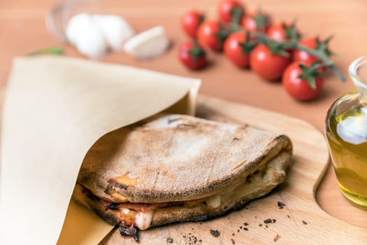 Pinsa romana and scrocchiarella gourmet italian cuisine. Traditional dish in italy.