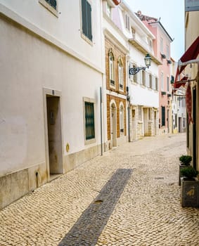 Pedestrian cobblestone street in Cascais, Portugal