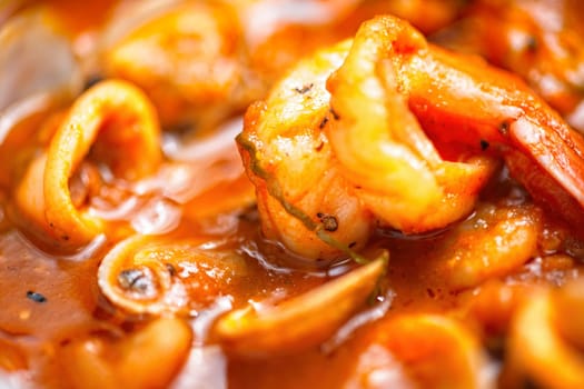 rustic italian seafood soup in garlicky tomato sauce