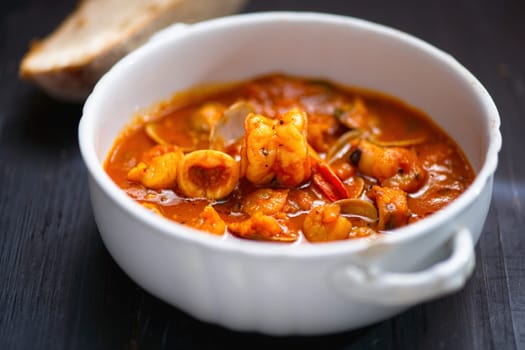 rustic italian seafood soup in garlicky tomato sauce