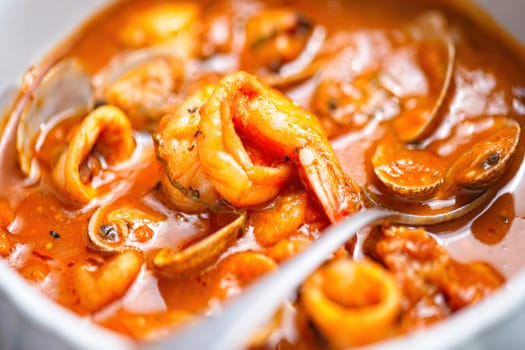 rustic italian seafood soup in garlicky tomato sauce