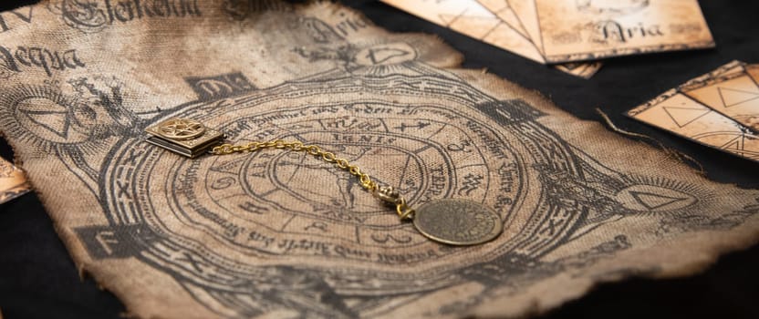 Ancient esoteric witchcraft background. Occultims and paganism old symbol, with mysterious runes and alphabet.