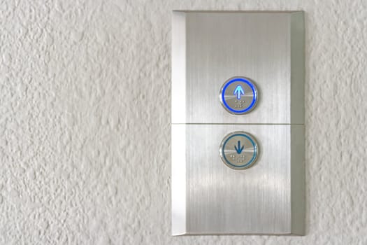 Press the elevator up and keypad elevator