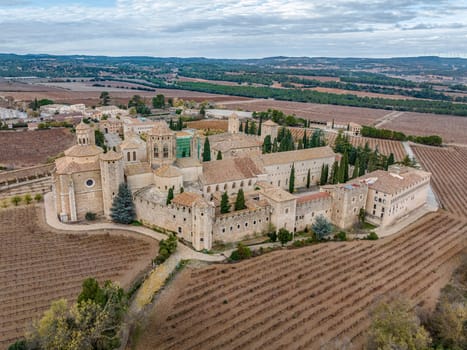 Monastery of Santa Maria de Poblet, Catalonia, Spain, side view with fall color tone