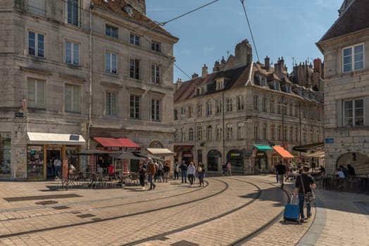 View of unidentified people on a street in Besancon, France