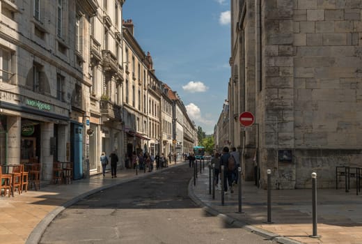 View of unidentified people on a street in Besancon, France