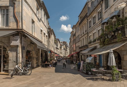 View of unidentified people on a street in Besancon, France