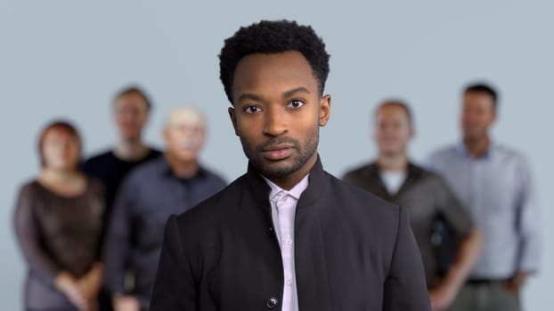 man leadership businessman in front of office team corporate work partnership successful professional wearing suit