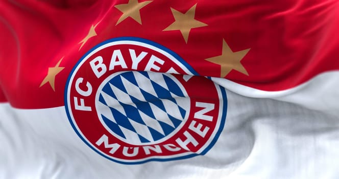Munich, GER, June 2022: Fabric background with the Bayern Munich Flag waving. Bayern Munich is a German sports club based in Munich