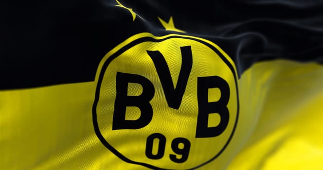 Dortmund, GER, September 2022: The flag of Borussia Dortmund waving in the wind. Borussia Dortmund is a German professional sports club based in Dortmund. 3d illustration
