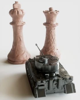 Toy tanks with chess on chessboard. Concept of military strategy. -- 3D Rendering