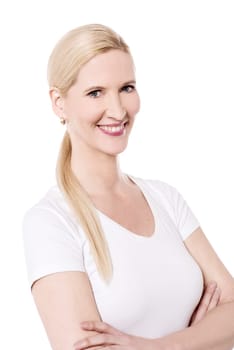 Beautiful woman posing with welcoming smile