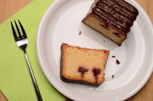 Sweet cherry cake on a white plate