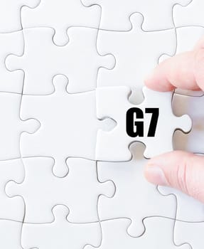 Last puzzle piece with word G7 SUMMIT. Concept image