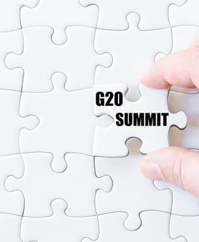Last puzzle piece with word G20 SUMMIT. Concept image