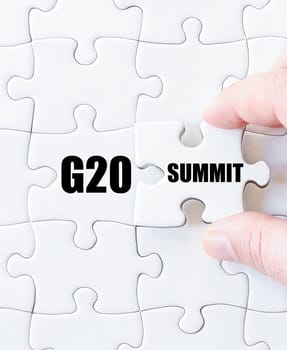 Last puzzle piece with word G20 SUMMIT. Concept image