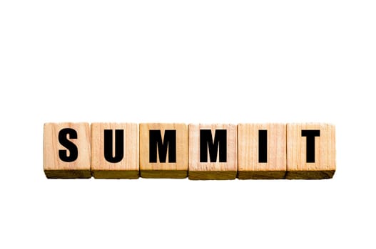 Word SUMMIT written on wooden small cubes with letters isolated on white background. Concept image with copy space available