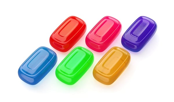 Six different fruit hard candies on white background