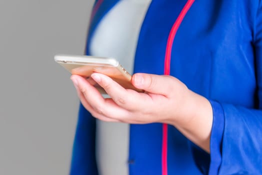 Women using smart phone mobile on blurred background