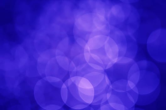 Light abstract dark bokeh christmas circle color glitter blurred black background