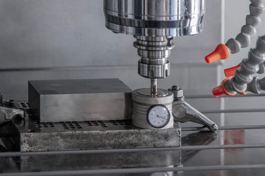 CNC machining center setting center bar after cutting metal