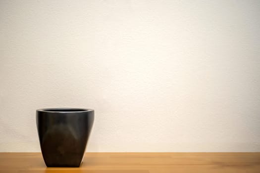 Black glass with a concrete background