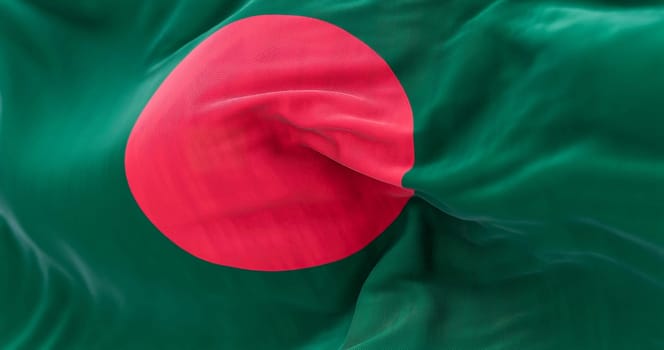 Close-up view of the Bangladesh national flag waving in the wind. People Republic of Bangladesh, is a country in South Asia. Fabric textured background. Selective focus. Realistic 3d illustration
