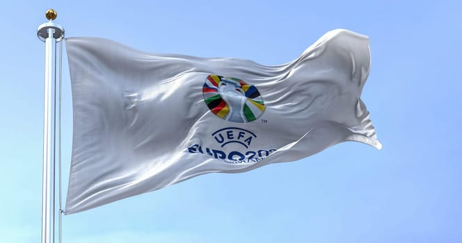 Berlin, DE, October 2022: The flag of UEFA Euro 2024 flying. The 17th edition will take place from 14 June to 14 July 2024 in Germany. Selective focus. International football event.