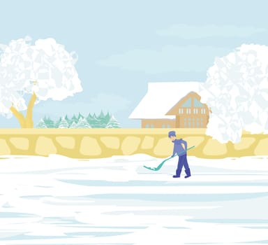Man shoveling snow on a beautiful winter day