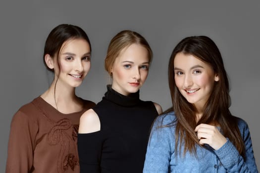 group of girls posing and expressing emotions