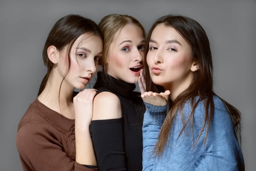 group of girls posing and expressing emotions