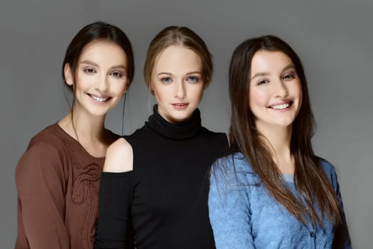 group of girls posing and expressing emotions