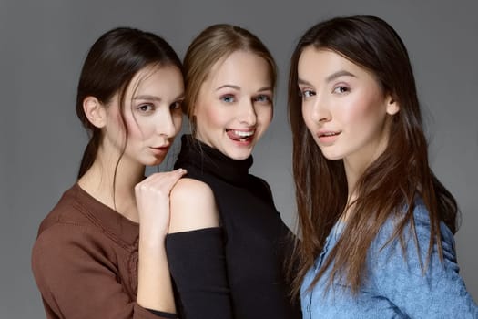 group of girls posing and expressing emotions