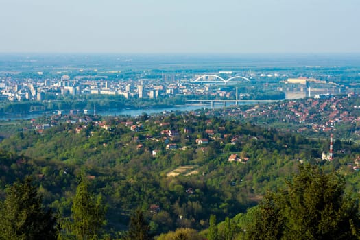 Landscape and cityscape of Novi Sad city from Fruska gora mount in Serbia.