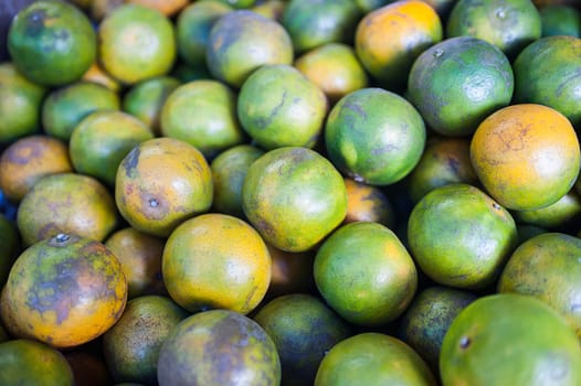 Orange fruit at the vegetable market in Phuket, Thailand