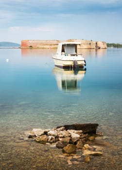 Anchored motor boat