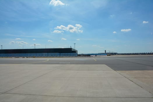 Frankfurt Airport Germany August 02, 2022 - Various buildings from the outside with runway and copy space