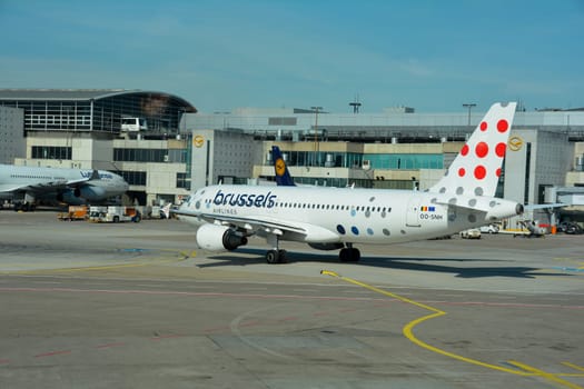 Frankfurt Airport Germany August 02, 2022 - Airplanes at the terminal with Brussels and Lufthansa