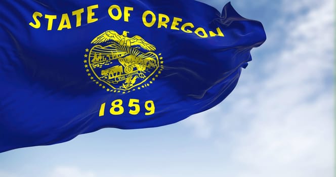 Oregon state flag waving on a clear day. Oregon is a state in the Pacific Northwest region of the Western United States. Fabric textured background. Selective focus. 3D illustration
