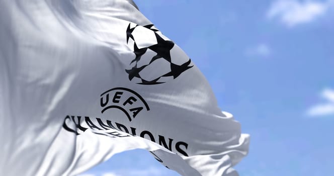 Istanbul, TR, Dec. 2022: UEFA Champions league flag waving on a clear day. Champion League is the most prestigious club competition in European football. Fabric textured background. 3d illustration