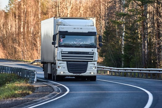 truckers driving on the highway, Russia, Arkhangelsk region, highway M-8 kholmogory 22,10,2022. High quality photo
