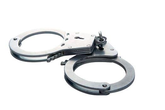 Metal handcuffs on a white isolated background, copy space. High quality photo