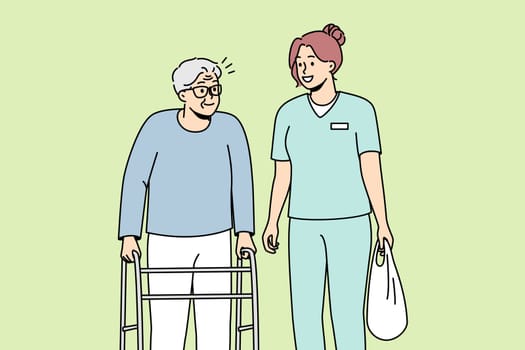 Woman health care worker helps elderly disabled person with walking frame. Medical professional carries bag of physically handicapped old man with walker. Vector line art multicolored illustration.