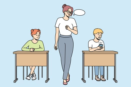 Teacher makes remark to schoolboy looking at cell phone in classroom. Teacher gives comment to pupil playing in smartphone at lesson at school. Vector outline colorful illustration isolated on blue.