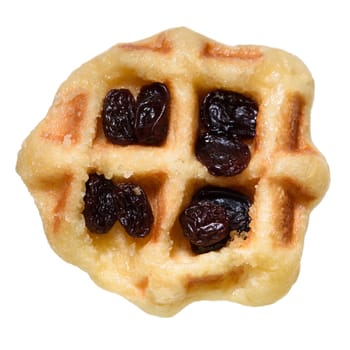 Top view close up of fresh waffle with dried raisins delicious sweet on top isolated on white background. Making homemade food or dessert at home