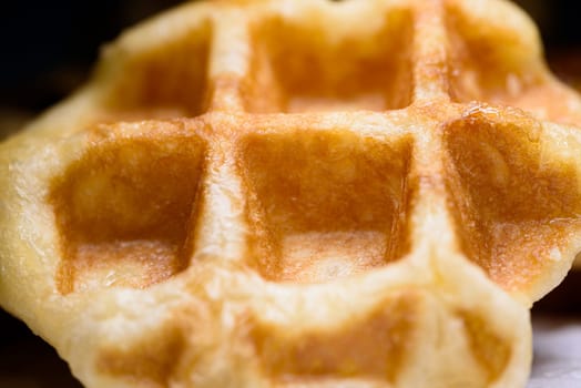 Top view close up of fresh waffles delicious sweet. Making homemade food or dessert at home